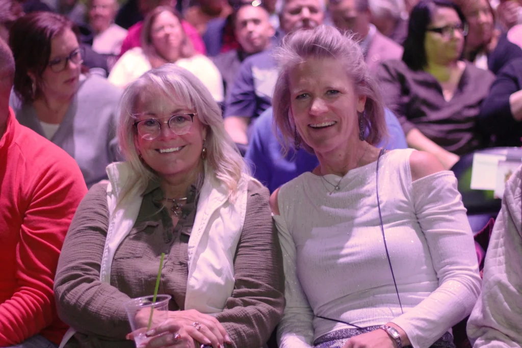 Attendees laughing at Alpha Grand Rapids Comedy Night Event